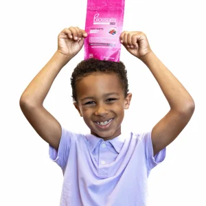 child holding blossom gum bag